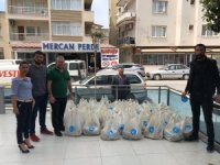 Kuşadası Ülkü Ocakları Ramazan Paketi Dağıtıyor